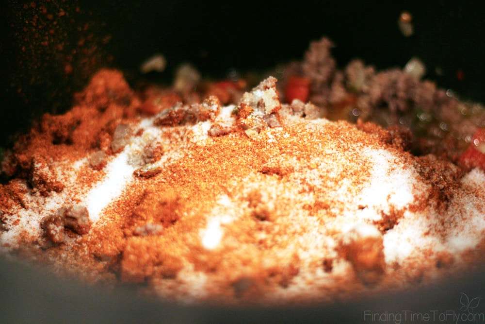 add the seasonings to the chili