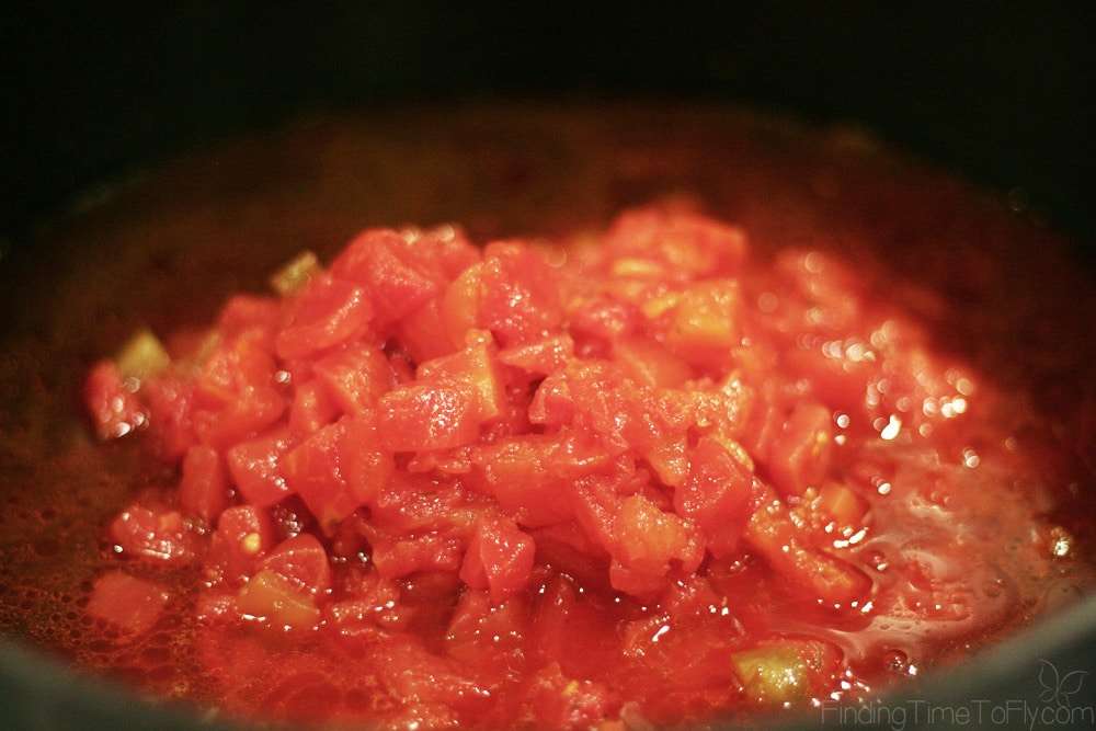 add diced tomatoes into chili