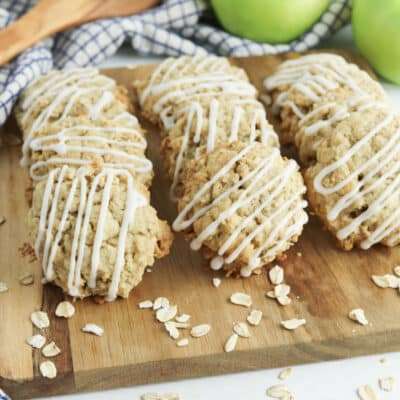 Apple Cinnamon Oatmeal Cookies on a wood cutting board
