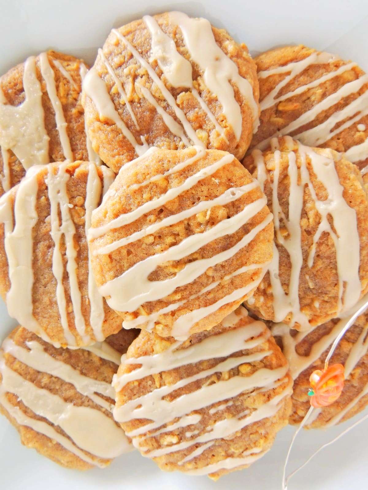 Closeup of maple glazed pumpkin spice oatmeal cookies