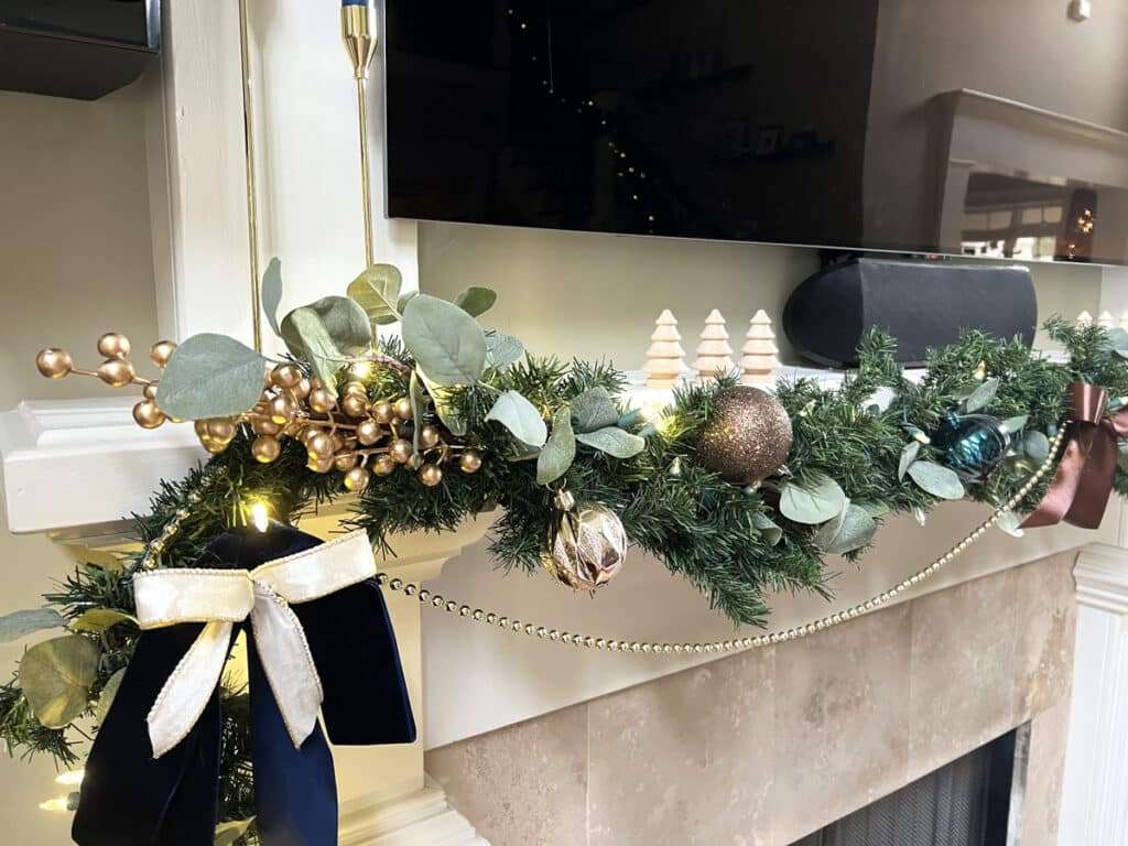 Blue and Bronze Christmas Decorations on the mantle