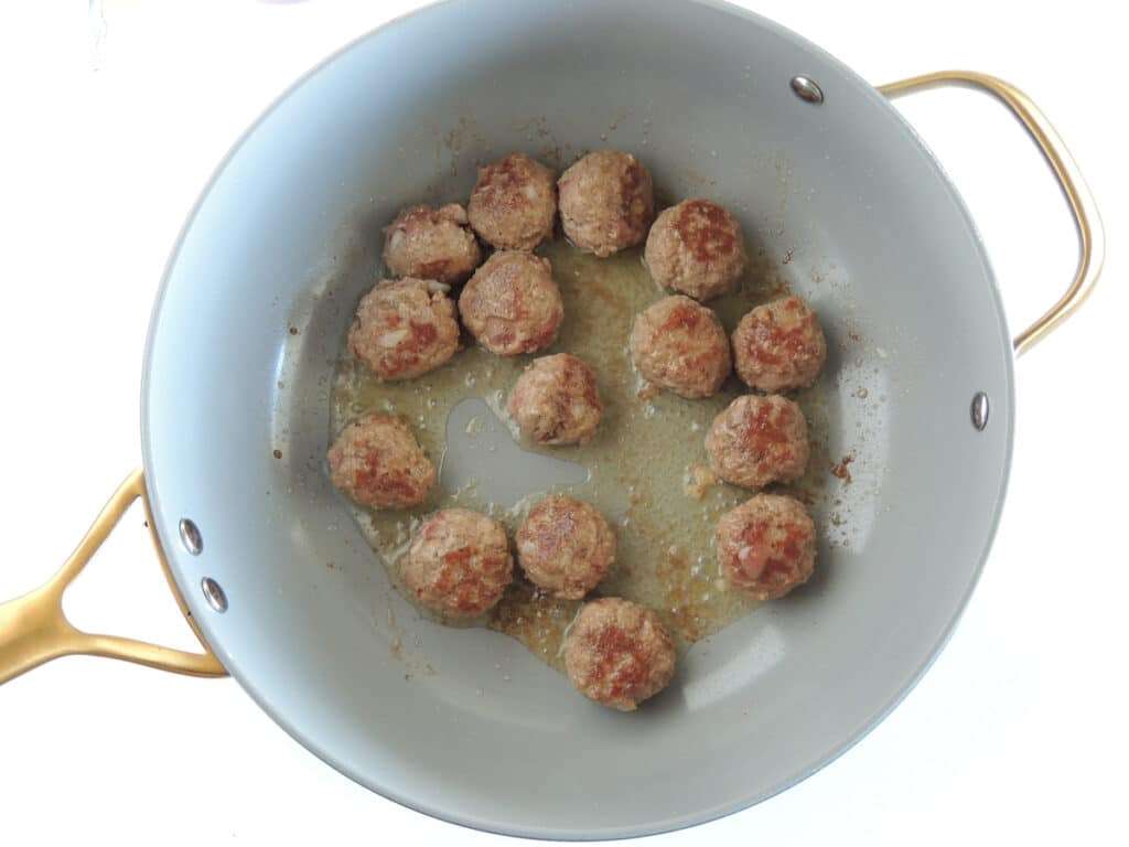 Brown all sides of the meatballs