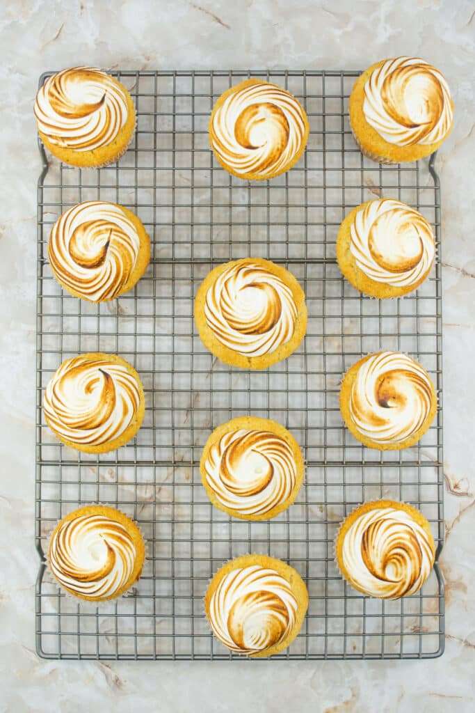 Use a kitchen torch to toast each meringue topping