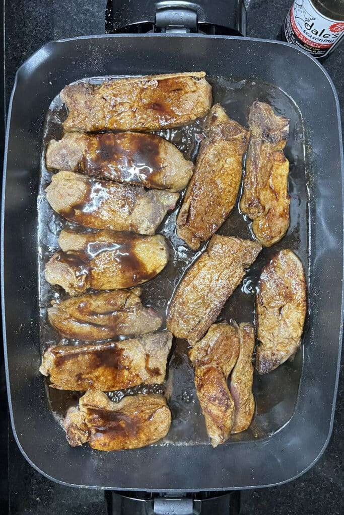 Pour Dale's sauce over ribs