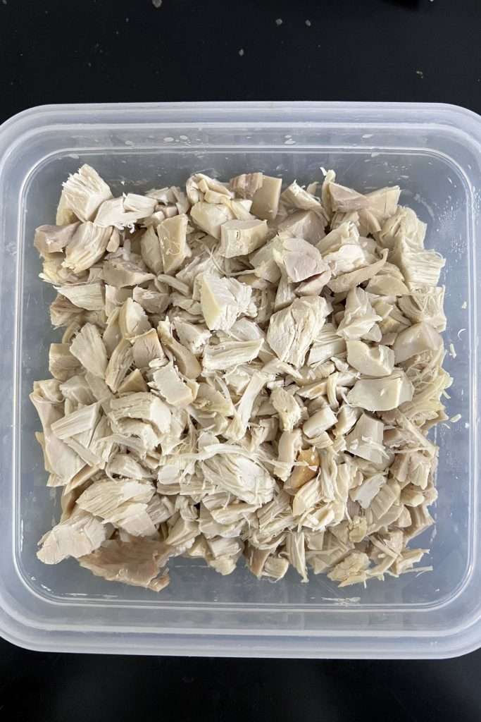 Debone rotisserie chicken and chop into bite-sized pieces