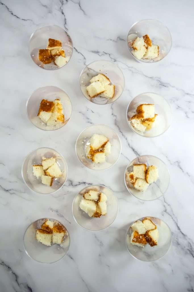 Add cake pieces into the bottom of the container