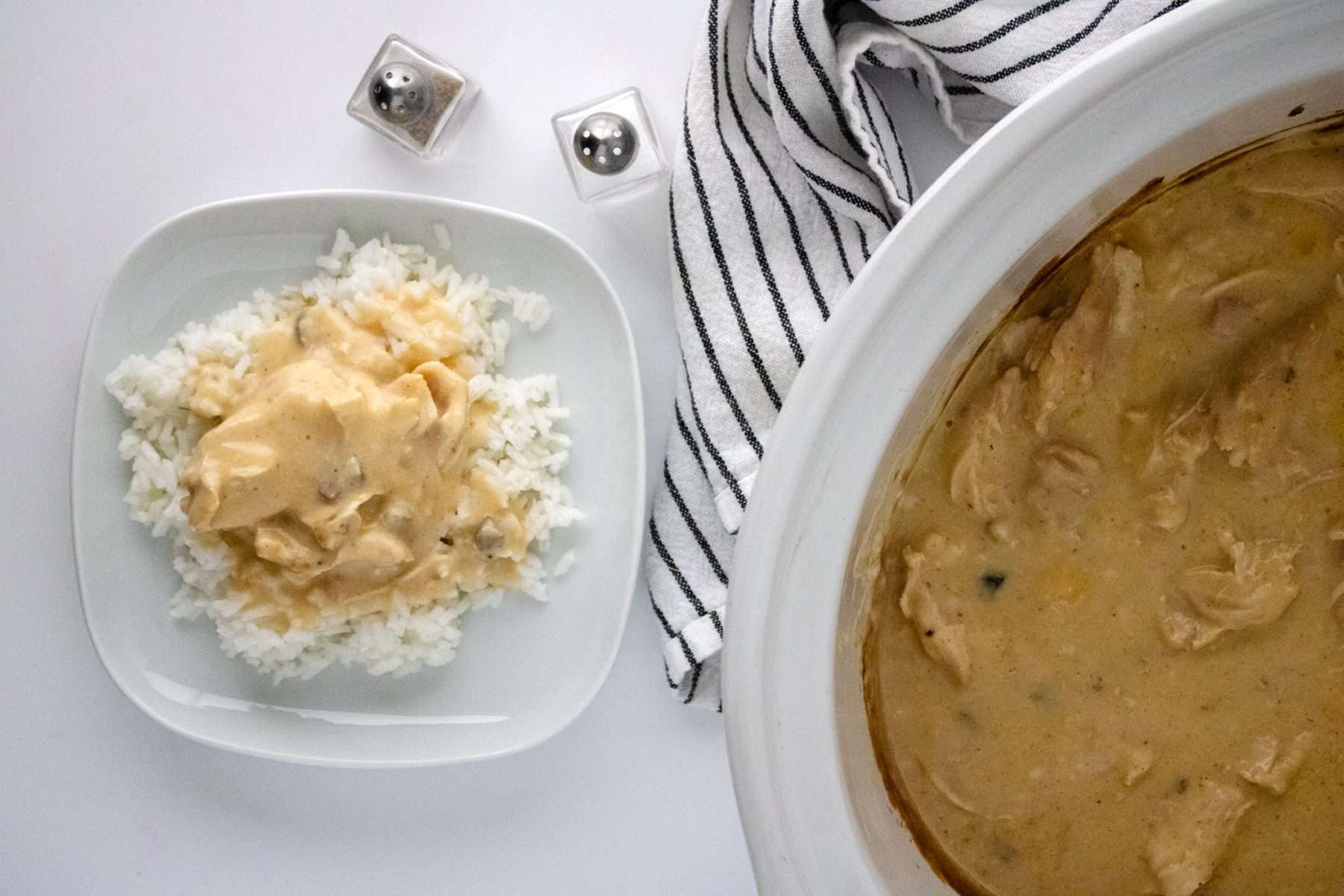 Slow Cooker Chicken and Gravy served over rice