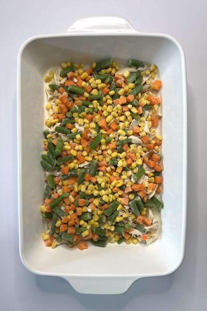 Add an even layer of frozen vegetables