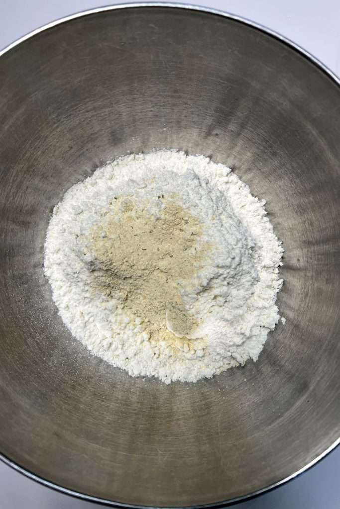 Add biscuit mix and seasoning packet to a bowl