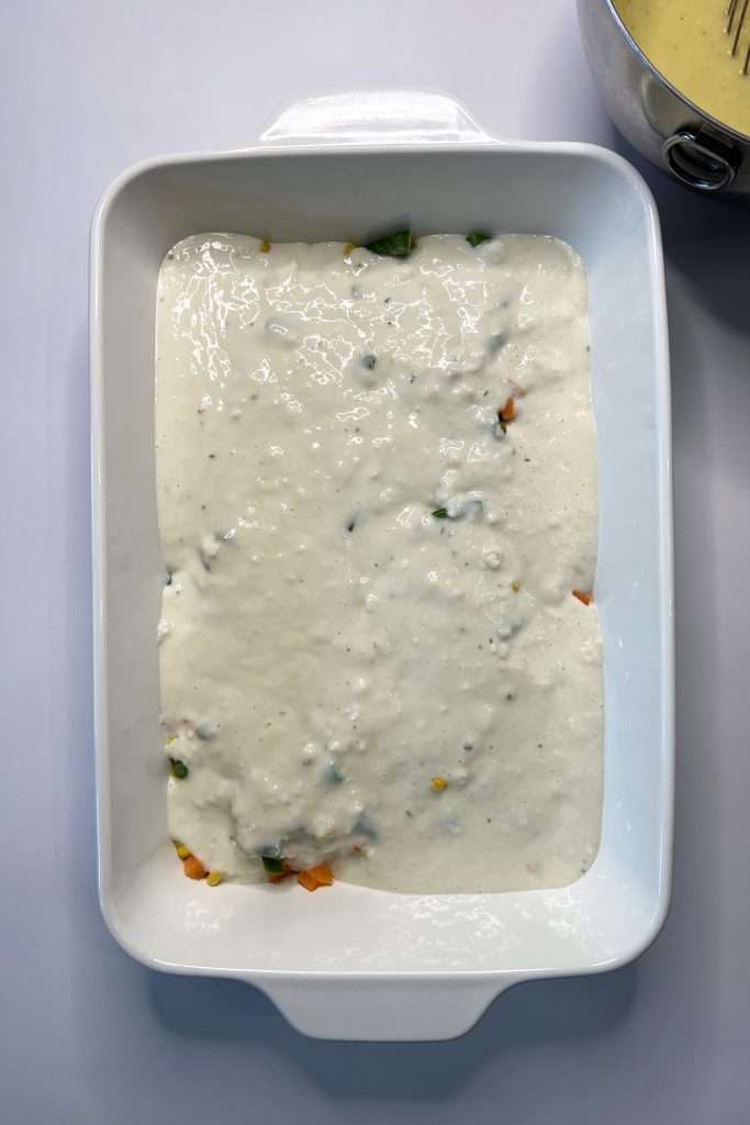 Spread evenly over the frozen vegetables