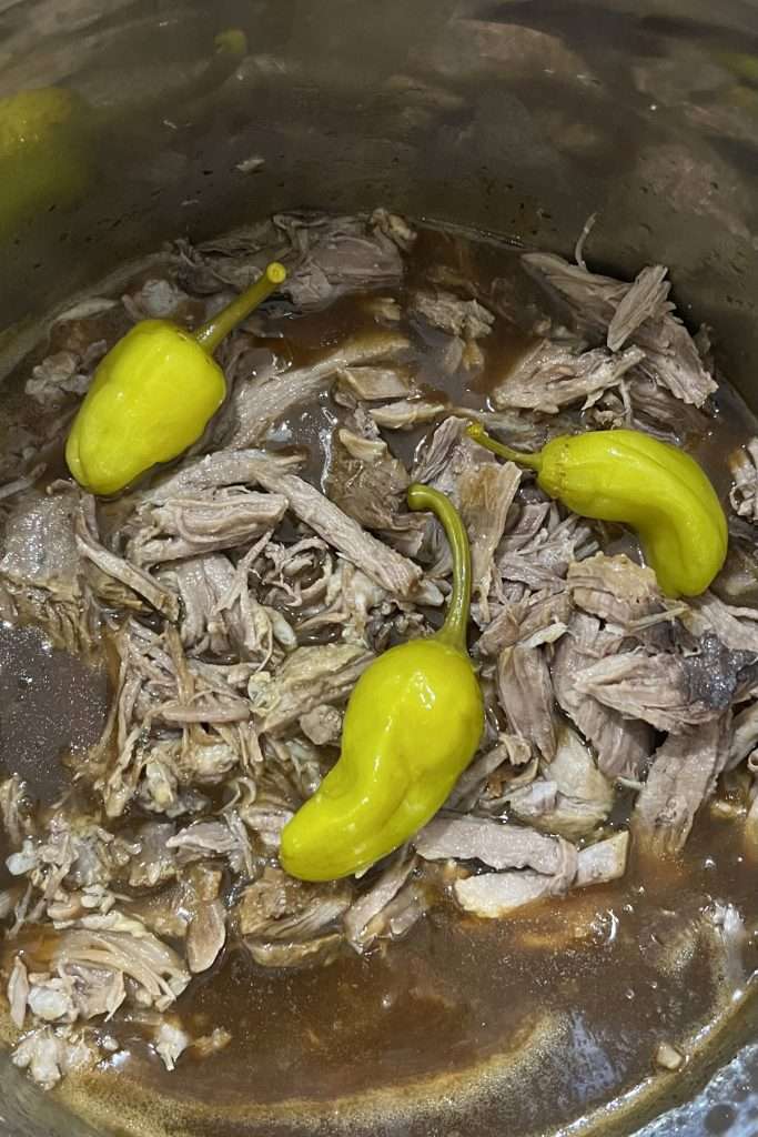Return the shredded meat to the instant pot and stir into the gravy.