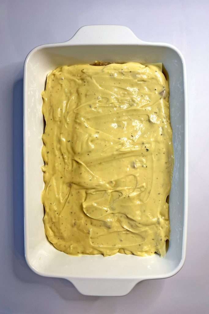 Spread soup mixture in an even layer on top of the cheese