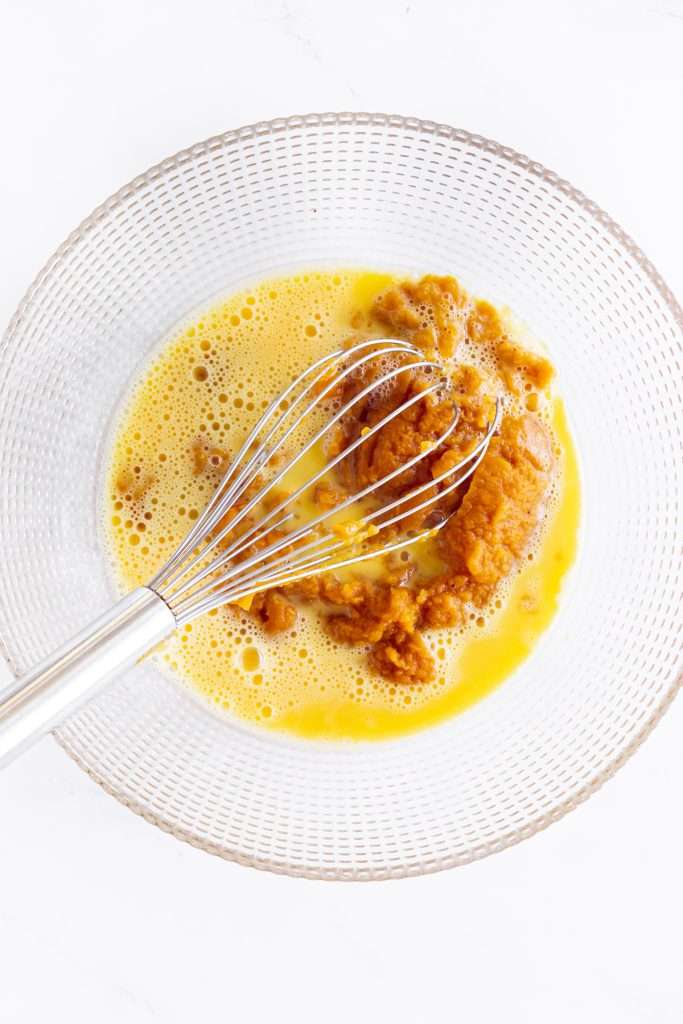 combine pumpkin, oil, and eggs