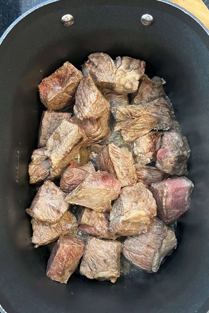 Place all seared beef into the crockpot