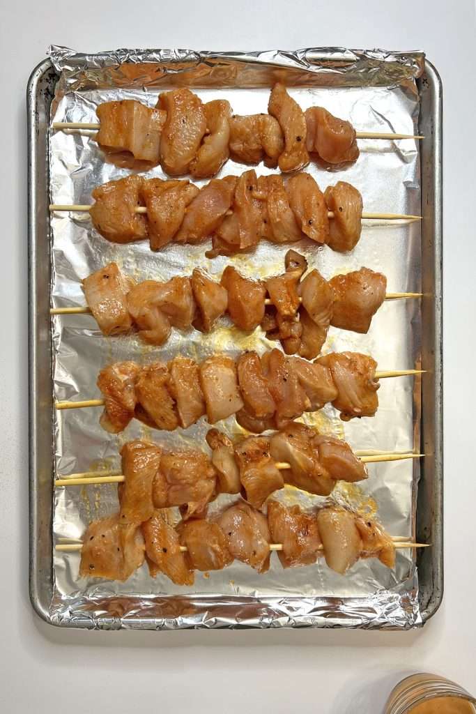 Thread chicken onto skewers