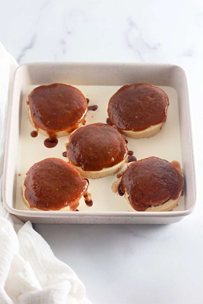 Top the cinnamon rolls with the brown sugar mixture