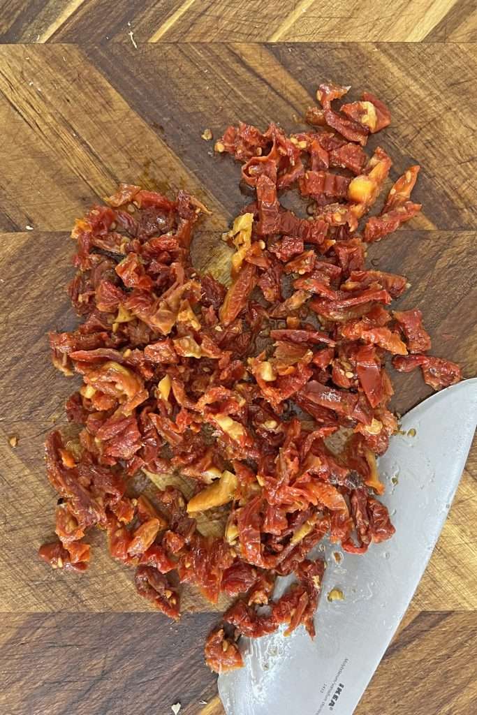 Dice the sun-dried tomatoes