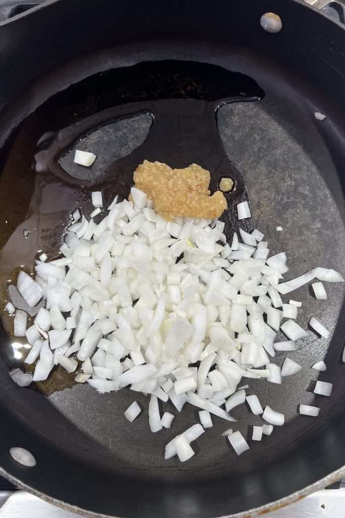 Saute onion and garlic in oil