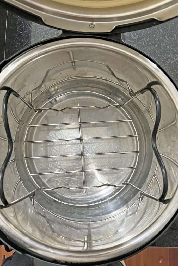 Put 2 cups of water into the bottom of the Instant Pot