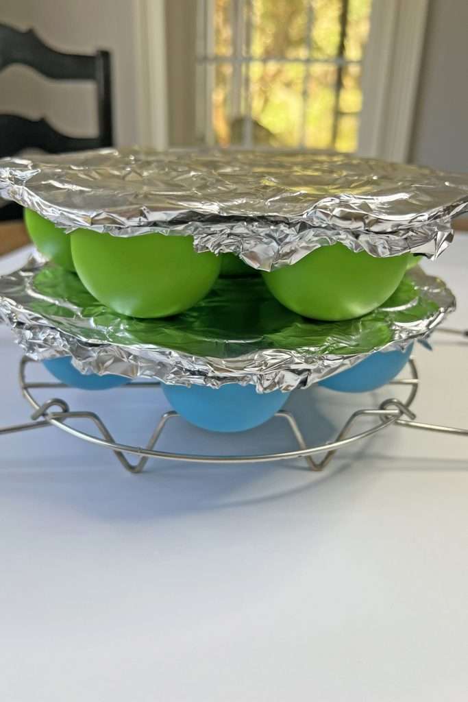 Slightly off-set them so the muffin wells are not directly on top of each other