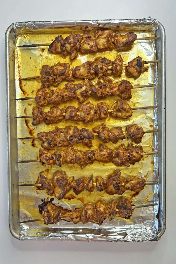 Bake in a 450 degree F oven for 15 minutes, then finish on broil for 1-2 mintues.