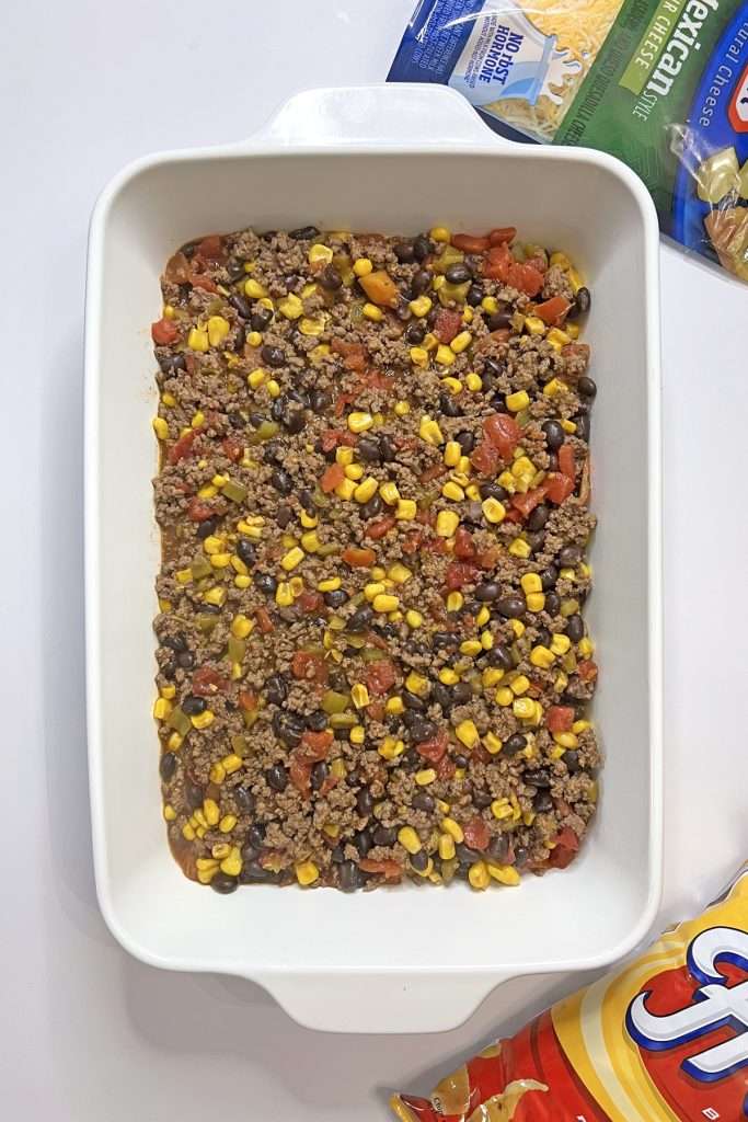 Place meat mixture into prepared casserole dish