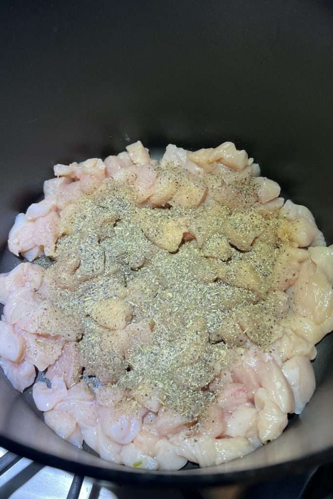 Season chicken and cook in olive oil until done