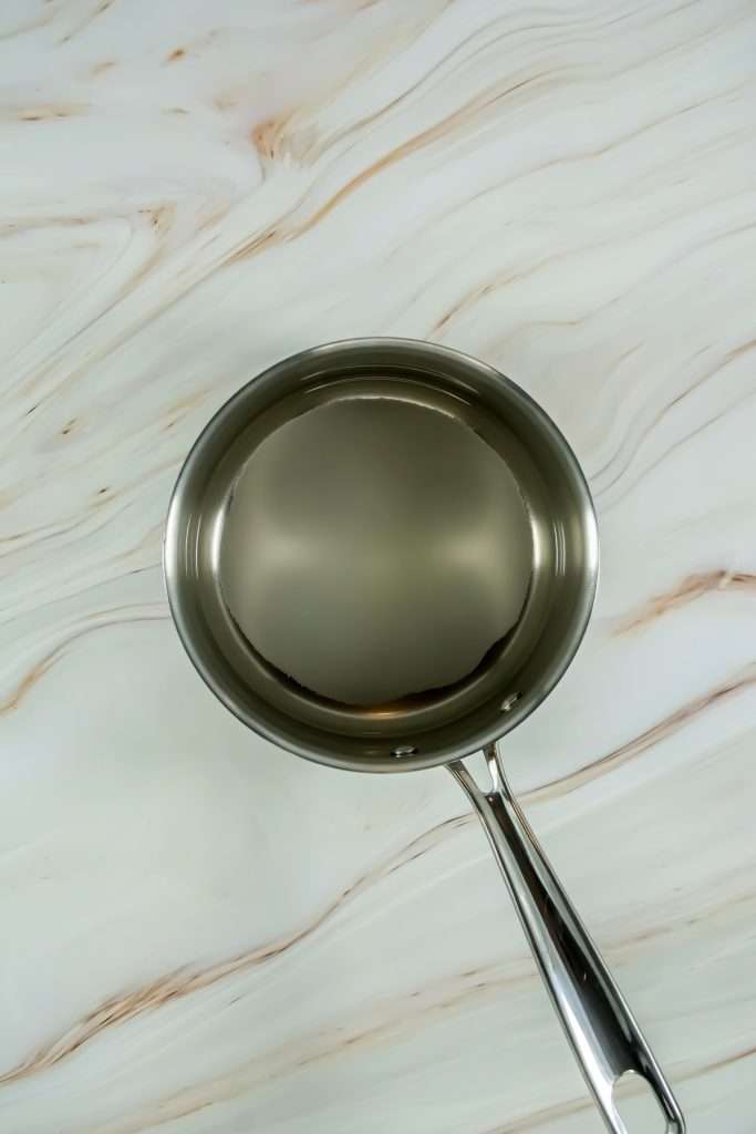 Combine sugar and water in a sauce pan