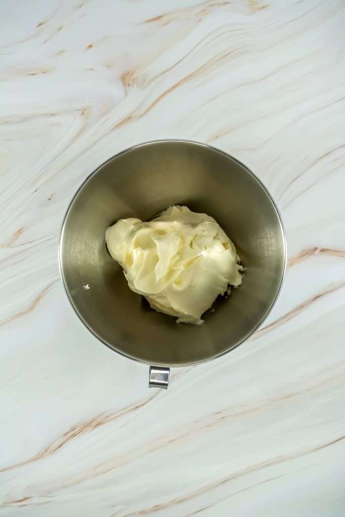 Begin by placing the mascarpone cheese in a large bowl.