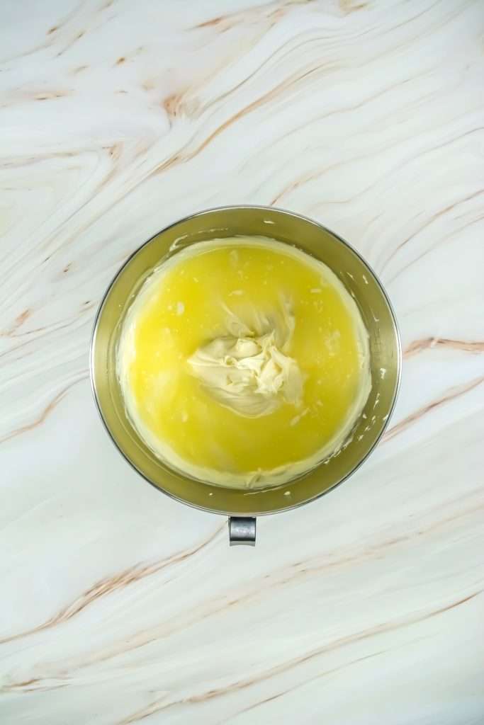 Pour in the limoncello and lemon juice.