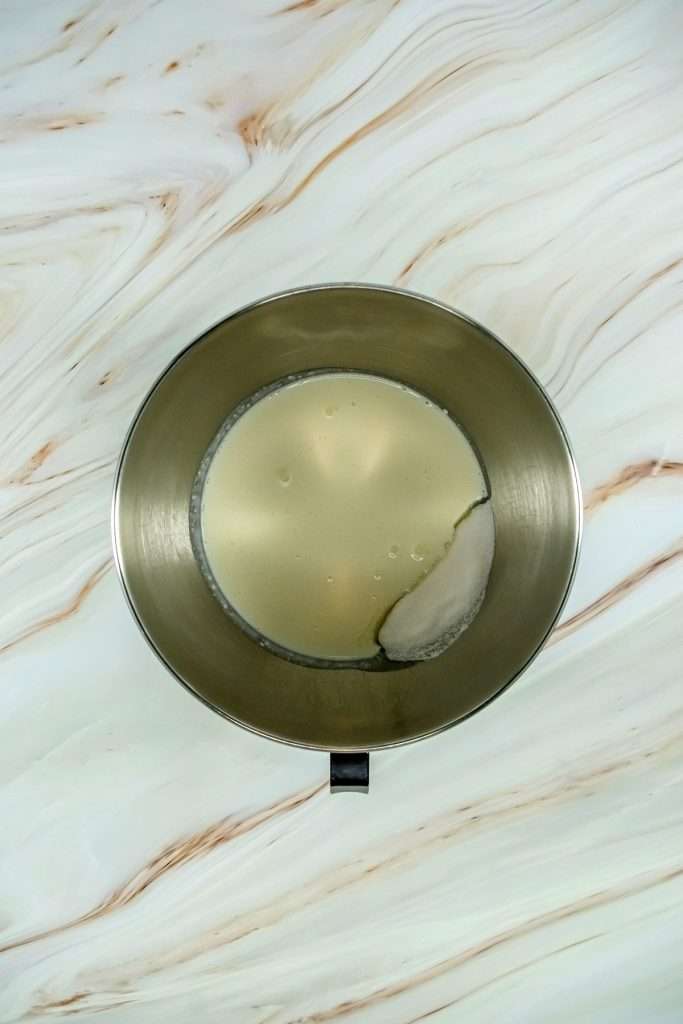 In a separate bowl, combine the heavy whipping cream and sugar.