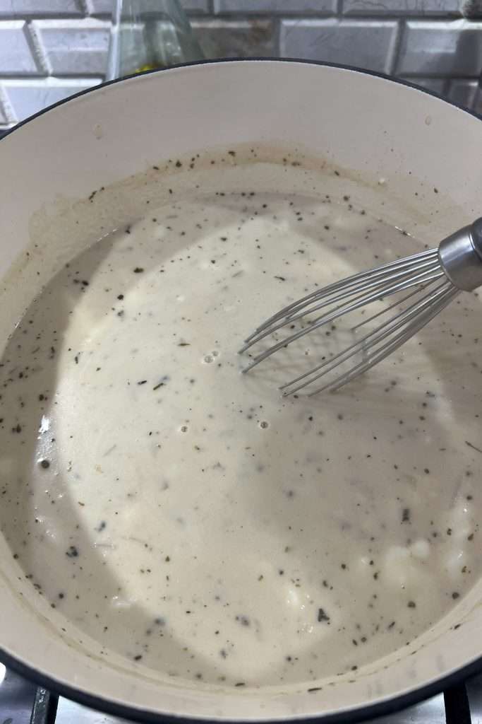 Stir with a whisk to break up any clumps of mashed potatoes