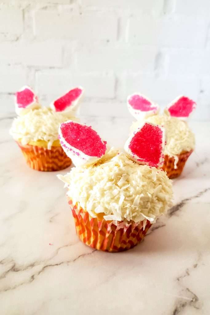 Place ears on cupcake