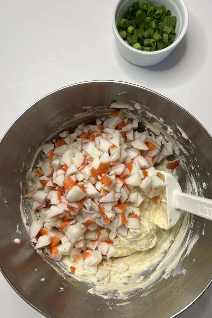 Add chopped crab meat.