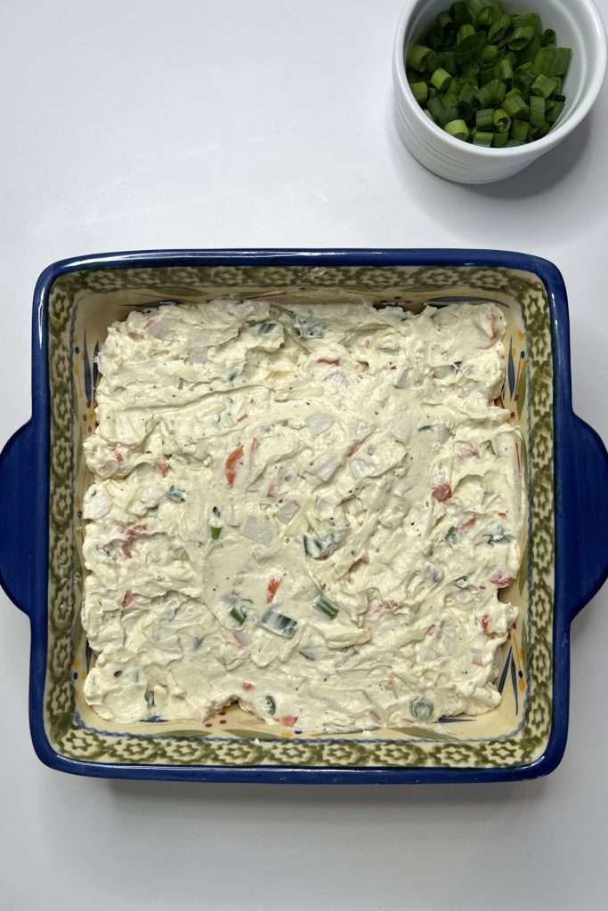 Spread evenly in a baking dish.
