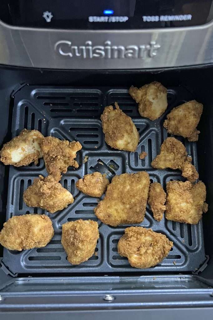 Cook chicken nuggets according to package directions