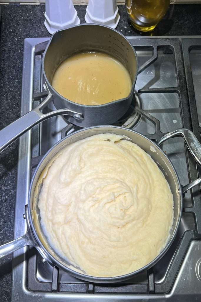Prepare mashed potatoes and heat gravy