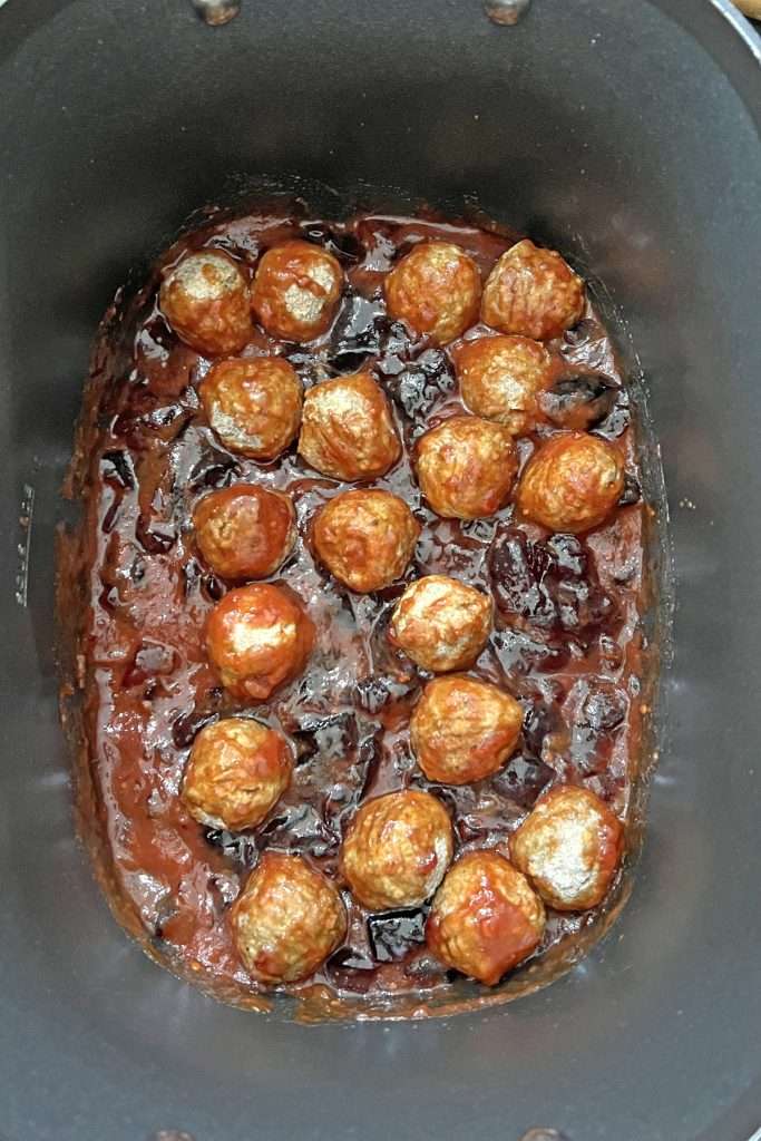 Add frozen meatballs and stir to coat with the sauce.