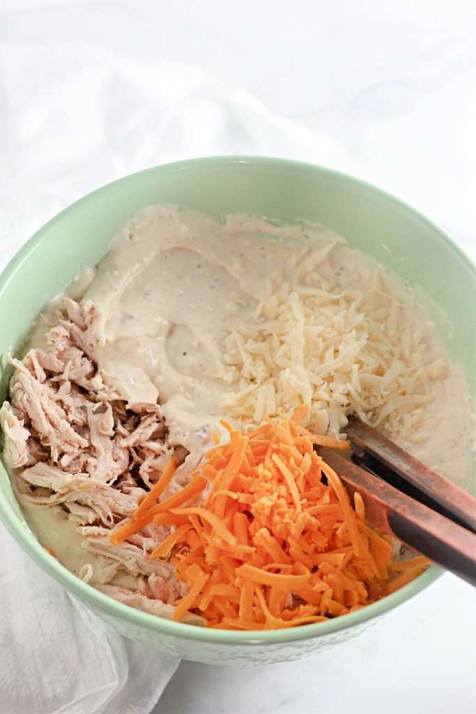 Add chicken and cheeses
