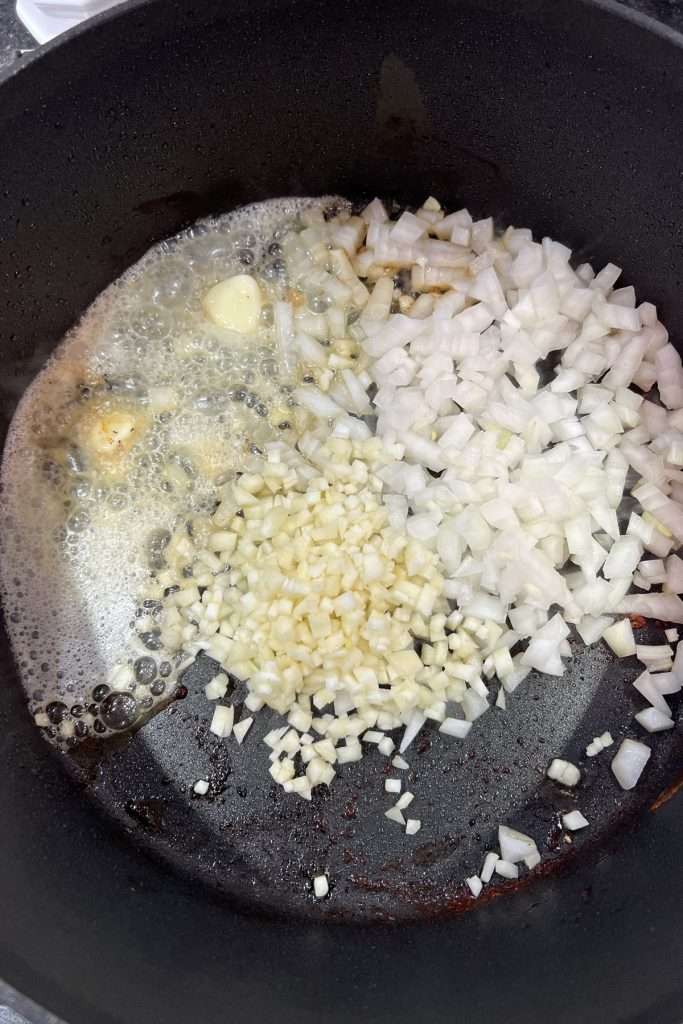 Sauté onions and garlic in butter
