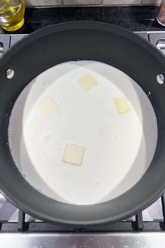 Combine butter, cream, and milk. Heat over medium.
