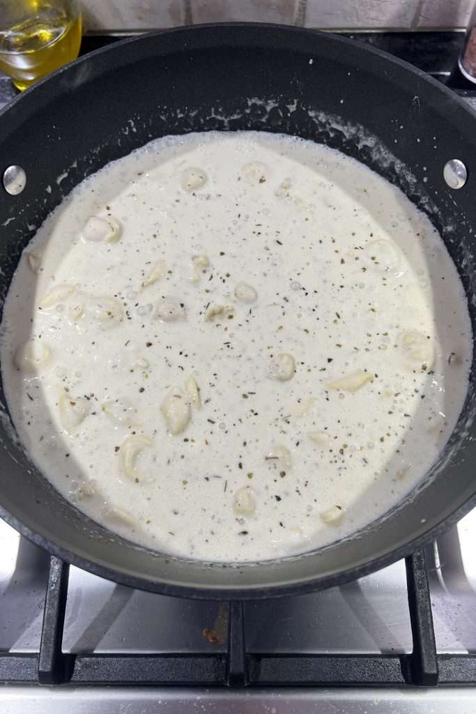 Stir to coat all the tortellini