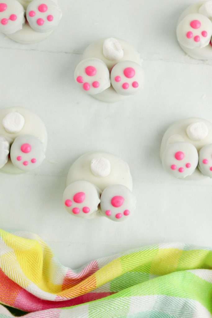 Add pink paw details