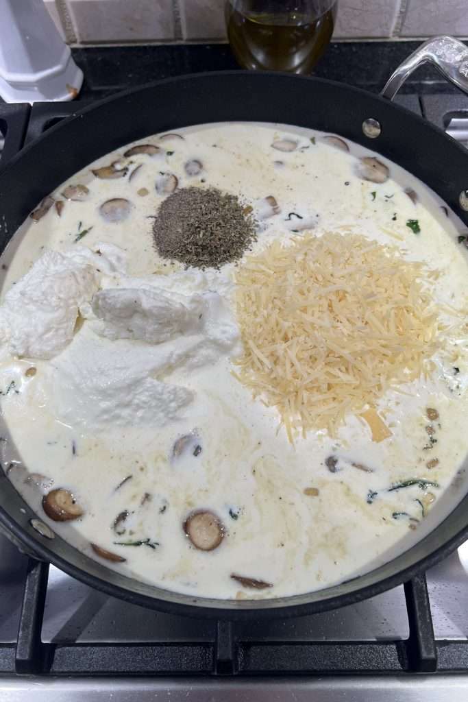 Add ricotta, parmesan, and seasonings.
