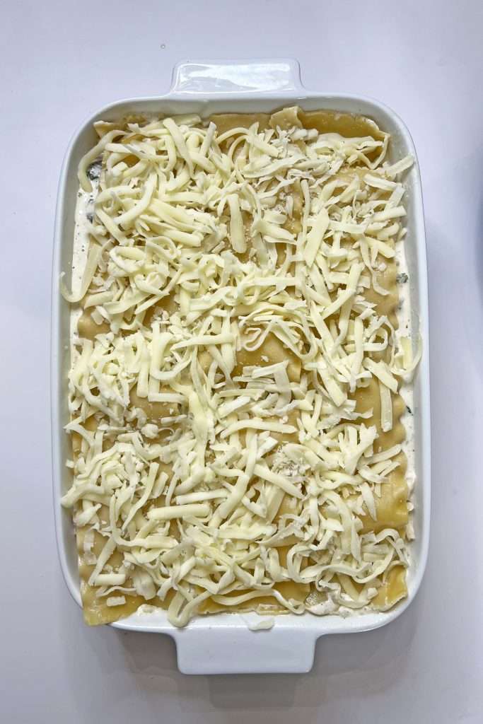Top with shredded mozzarella.