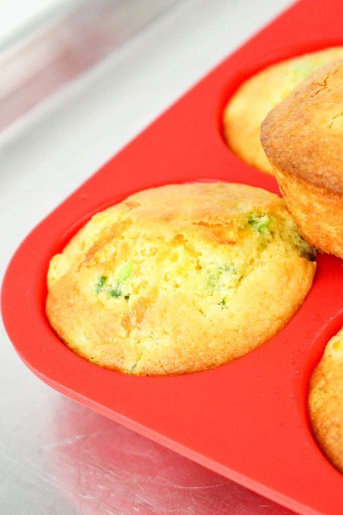 Slightly cool before removing from the muffin pan.