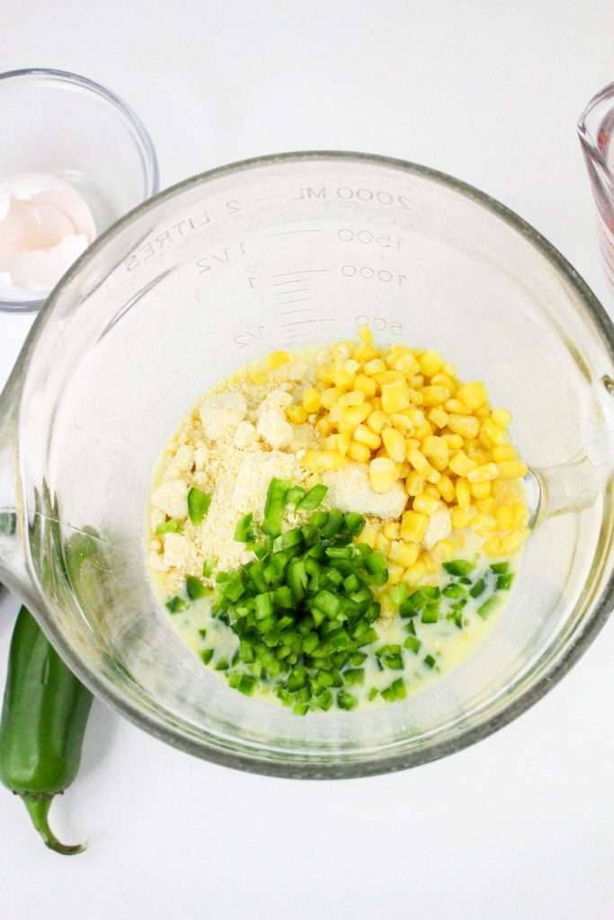 Add in corn and diced jalapeños.