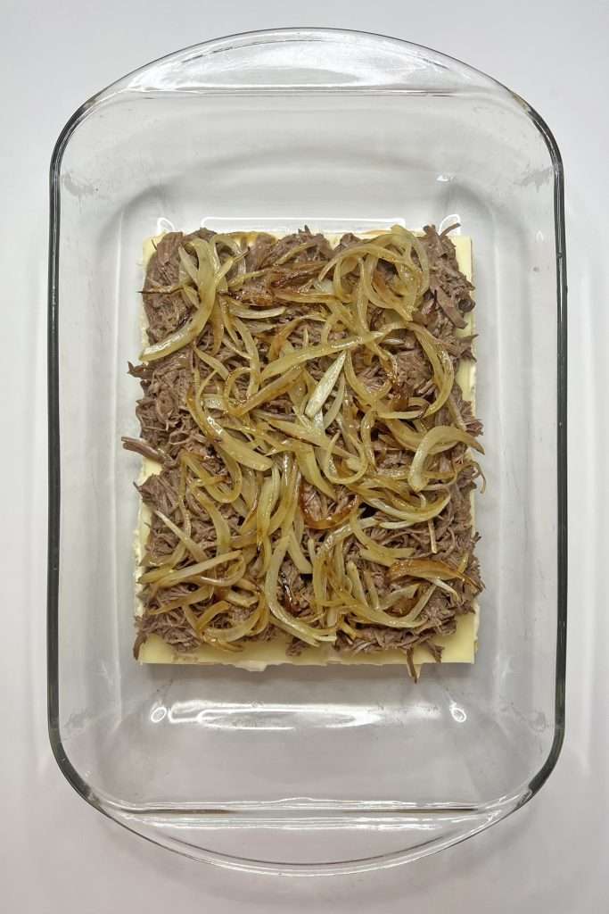 Add a layer of caramelized onions