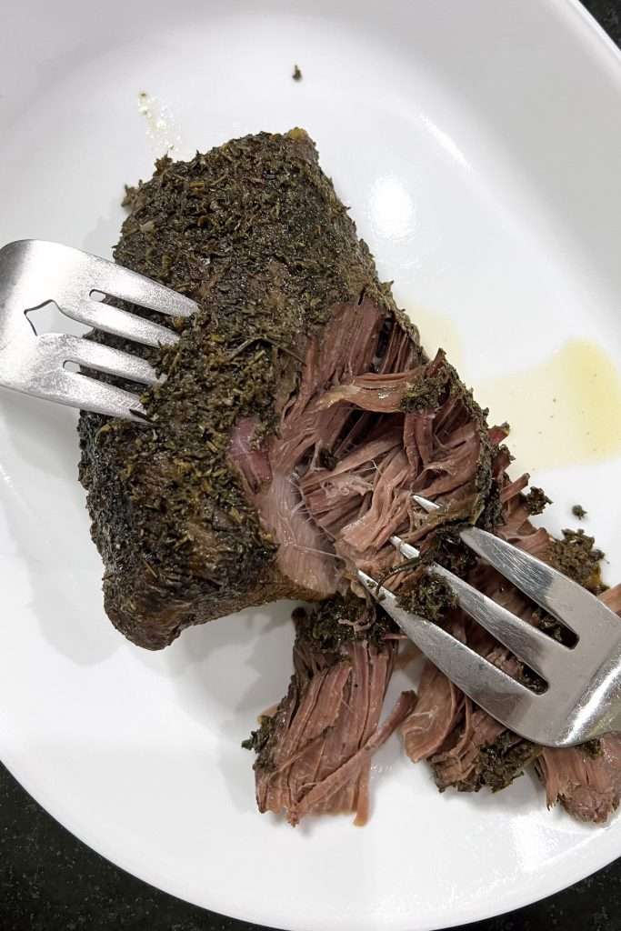Remove beef and shred with two meat forks