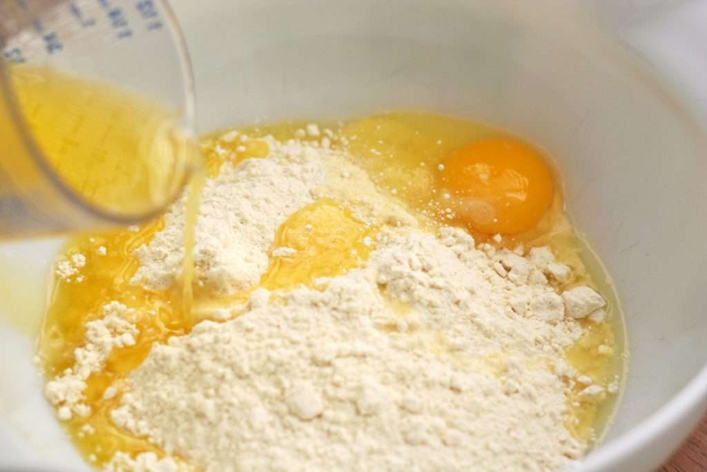 Combine cake mix, butter, and one egg.
